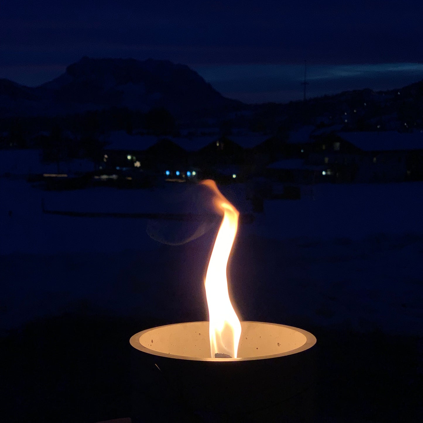 Outdoor fire with permanent wick